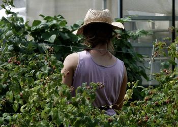 Rear view of woman wearing hat