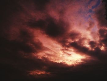 Low angle view of dramatic sky at sunset