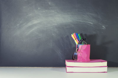 Close-up of multi colored pencils on table