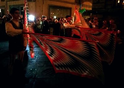 Group of people in the dark