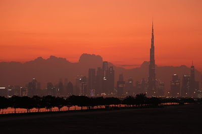 High angle view of city at sunset