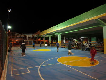 View of illuminated people at night