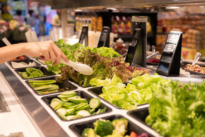 Midsection of food at market stall