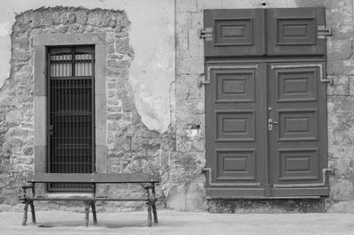 Bench in front of a house