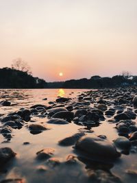 Scenic view of sea against sky during sunset