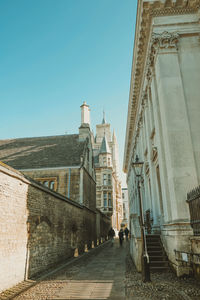 Low angle view of buildings against clear sky