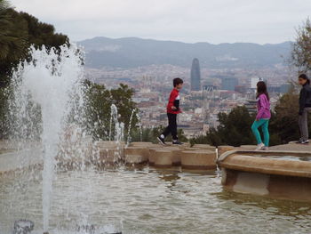 Tourists enjoying at riverbank