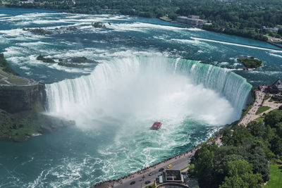 High angle view of waterfall in sea