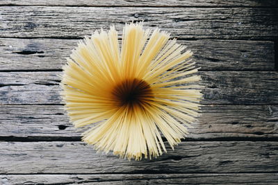 Directly above shot of toothpicks on wooden table