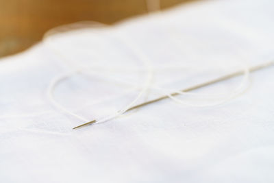 Close-up of thread with textile