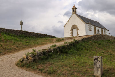 Exterior of historic building against sky