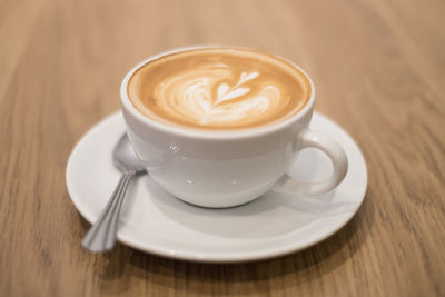 High angle view of cappuccino on table