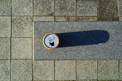 High angle view of manhole on street