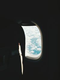 Airplane in sea seen through airplane window