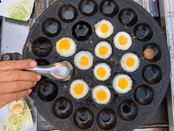 High angle view of person preparing food