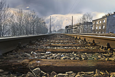 Close-up of railroad track against sky