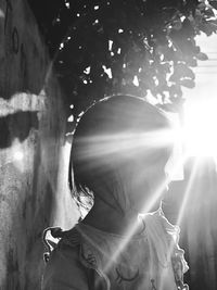 Portrait of woman standing outdoors