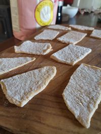 High angle view of bread on cutting board