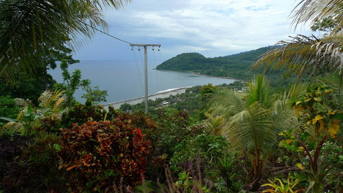 Scenic view of sea against cloudy sky