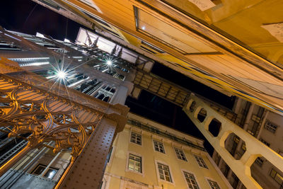 Low angle view of illuminated building at night