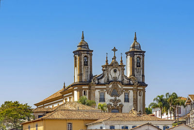 Low angle view of cathedral against clear blue sky