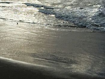 Close-up of reflection in sea