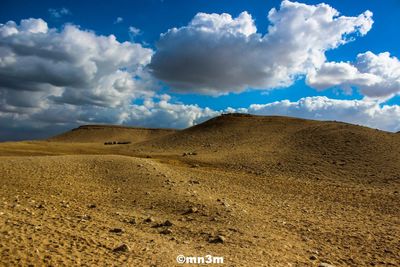 Scenic view of desert against sky