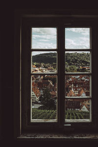 View of cityscape through window