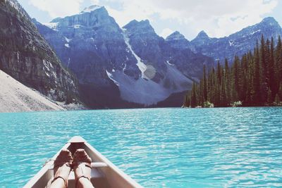 Scenic view of lake with mountains in background