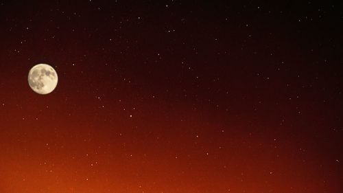 Low angle view of moon in sky