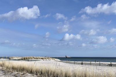 Scenic view of beach against sky