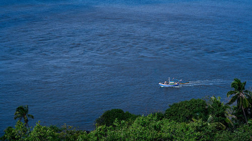 High angle view of boats on sea shore