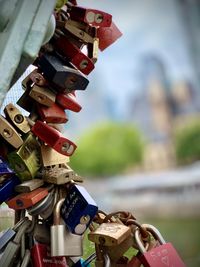 Close-up of padlocks on railing