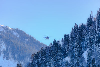 Scenic view of snow covered mountain against sky