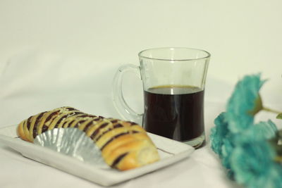 Close-up of drink served on table