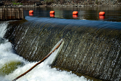 Scenic view of river flowing during winter