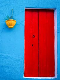 Close-up of closed red door