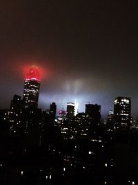 Illuminated cityscape at night