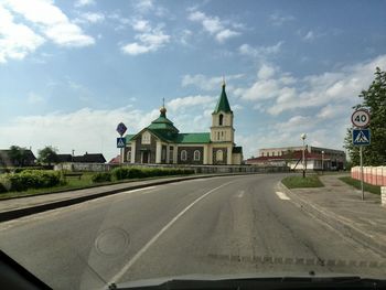 Road against cloudy sky