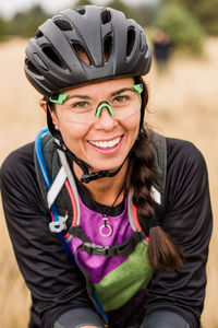 Portrait of smiling female mountain biker