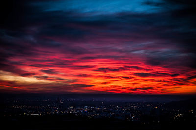 Dramatic sky over city during sunset