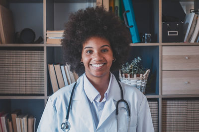 Portrait of smiling doctor in clinic