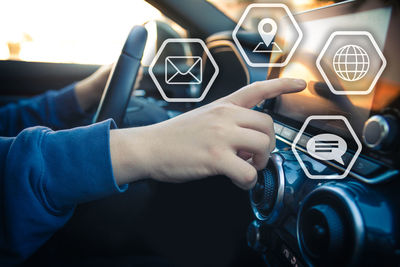 Drive using smartphone. automotive technology concept. infotainment, navigation communication device