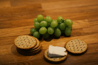 High angle view of cheese on cutting board