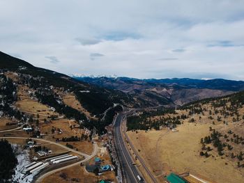 High angle view of road amidst landscape against sky