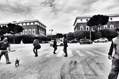 Man standing on city street