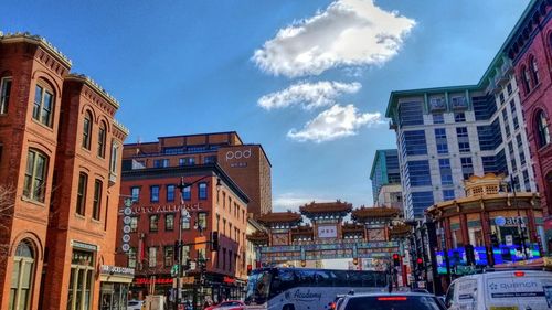 Low angle view of buildings against blue sky