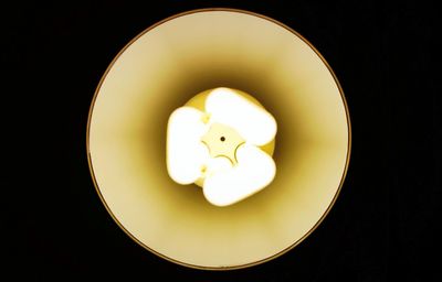 Close-up of illuminated light bulb