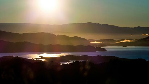 Scenic view of mountains at sunset