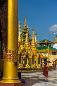 View of temple against building